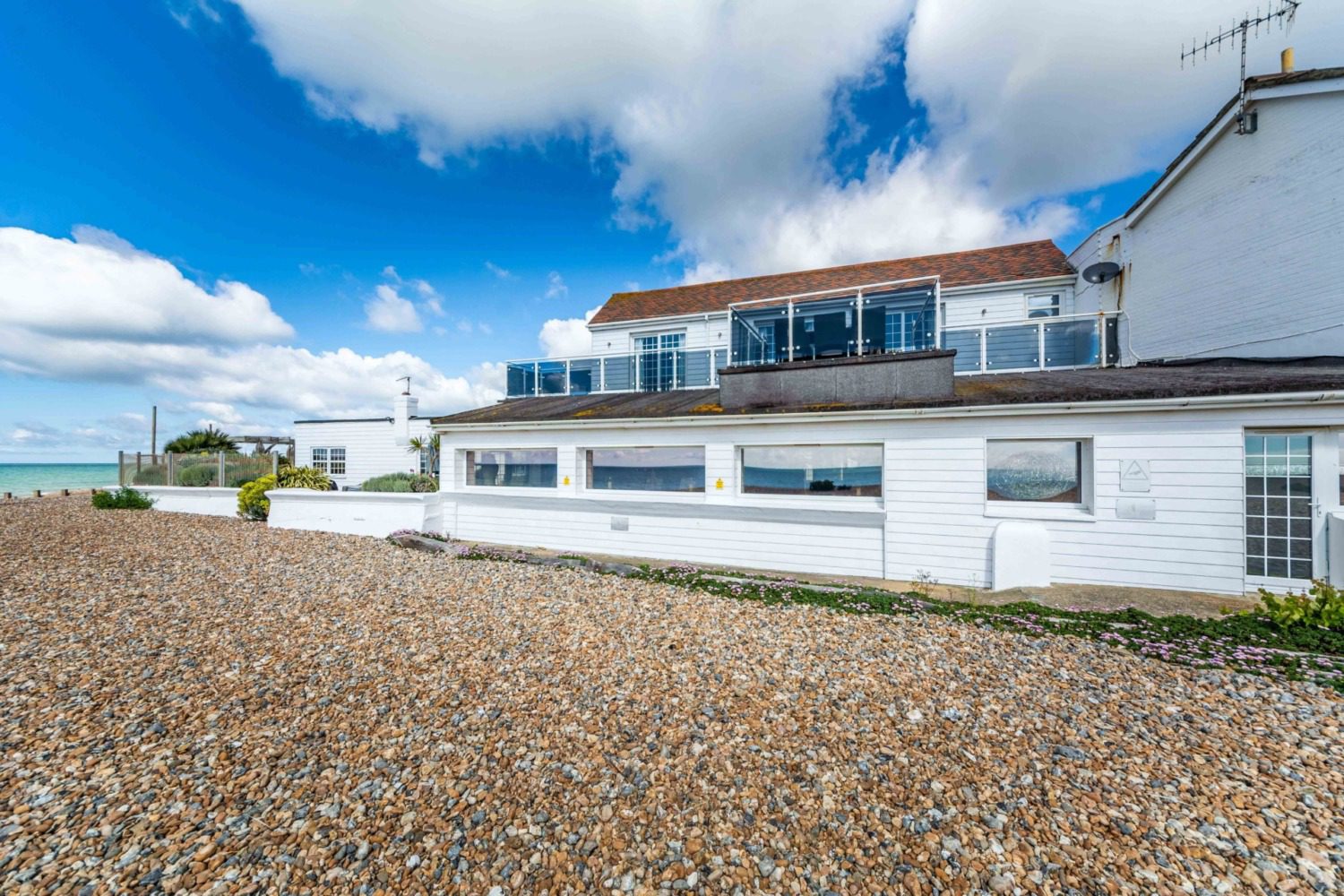 Our Family Beach Houses are, literally, on the beach.